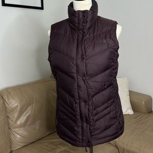 Purple vest used twice and very good condition. Limited edition.